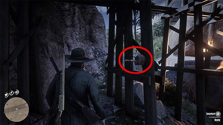 Find a head nailed to one of the bridge supports (as before, help yourself with your eyesight if necessary) and get a new piece of the riddle (Killer Clue Piece) - American Dreams in Red Dead Redemption 2 - Side quests - Red Dead Redemption 2 Guide